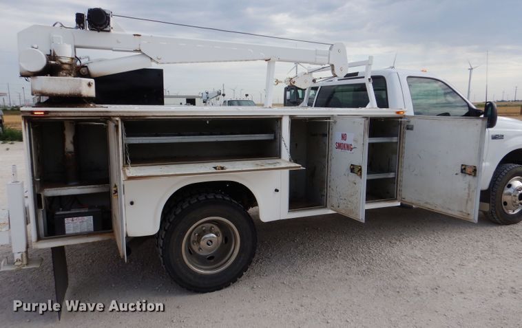 image for item DJ7669 1999 Ford F450 Super Duty XLT  utility / service truck