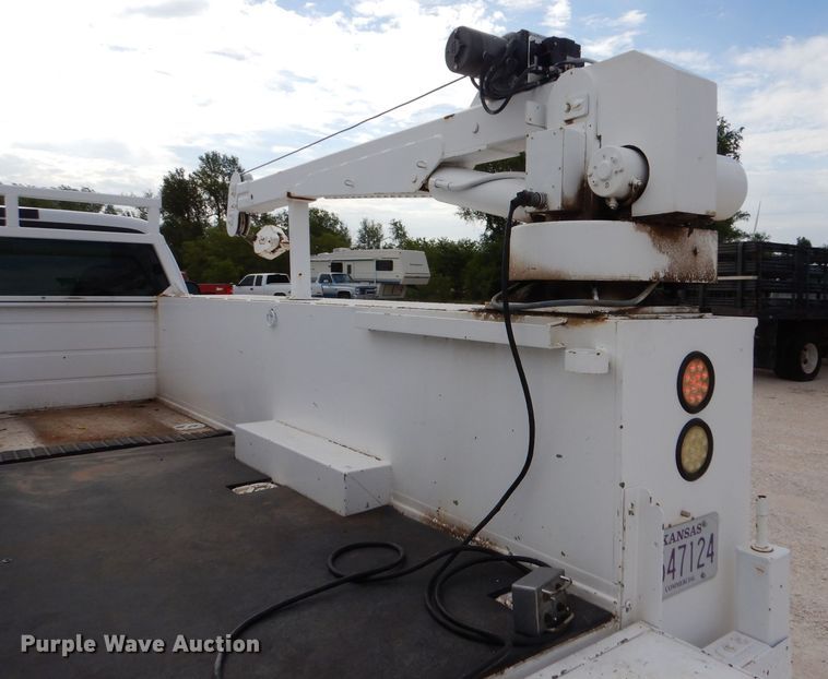 image for item DJ7669 1999 Ford F450 Super Duty XLT  utility / service truck