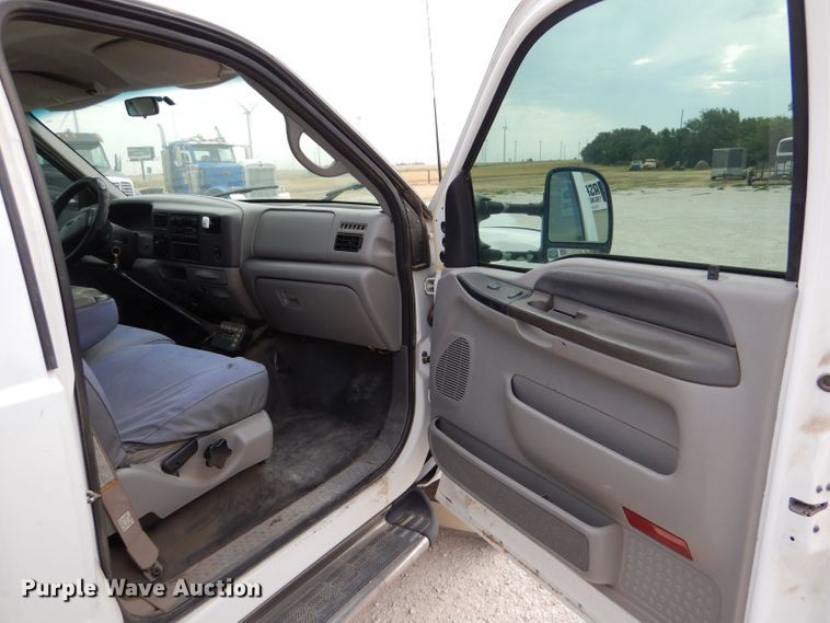 image for item DJ7669 1999 Ford F450 Super Duty XLT  utility / service truck