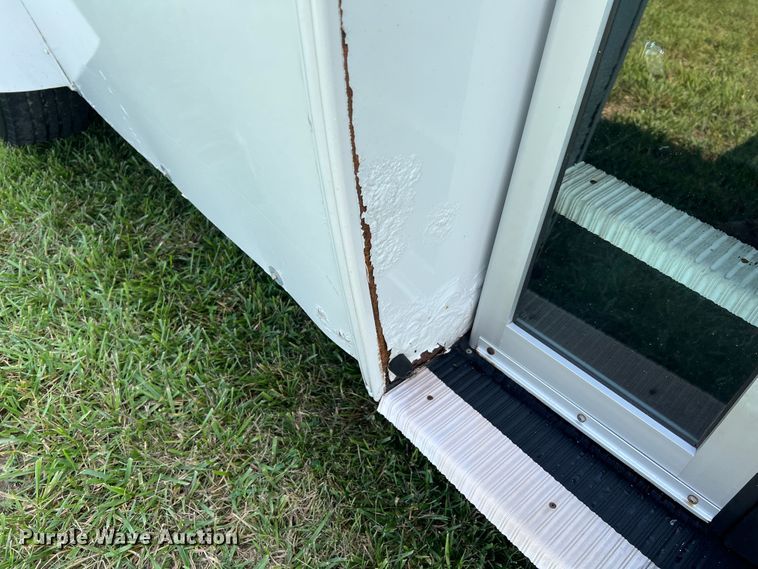 image for item JM9265 2011 Ford E350 Super Duty  shuttle bus