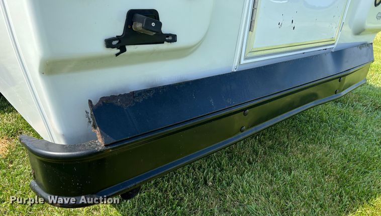 image for item JM9265 2011 Ford E350 Super Duty  shuttle bus