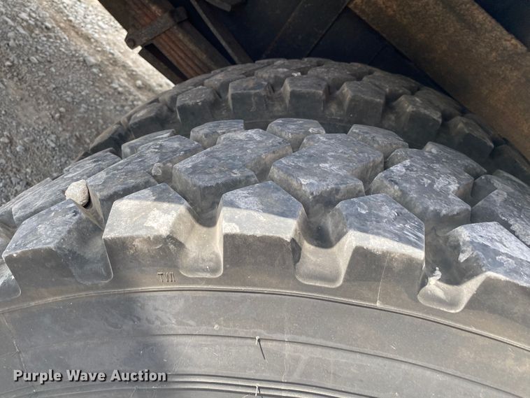 image for item JU9295 2003 GMC C7500  flatbed truck