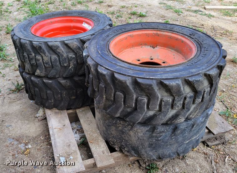 image for item KD9833 (4) 10-16.5 tires and wheels