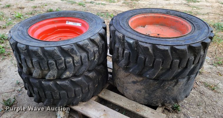 image for item KD9833 (4) 10-16.5 tires and wheels