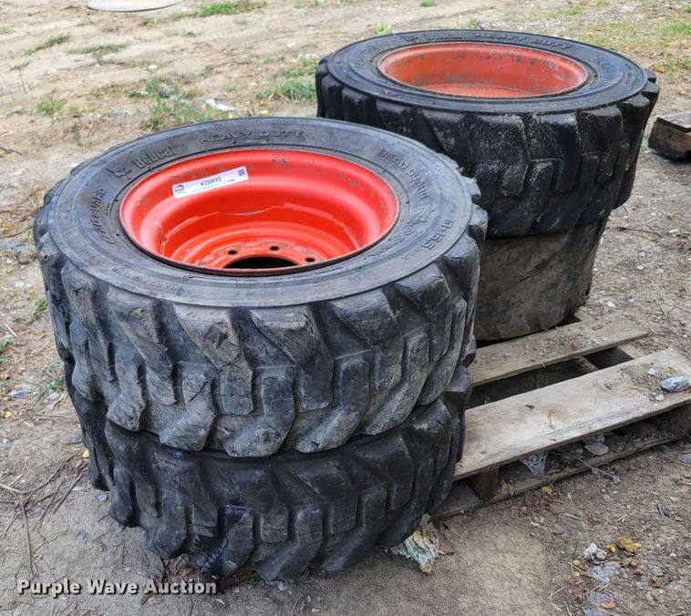 image for item KD9833 (4) 10-16.5 tires and wheels