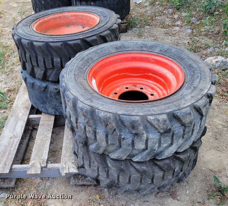 image for item KD9833 (4) 10-16.5 tires and wheels