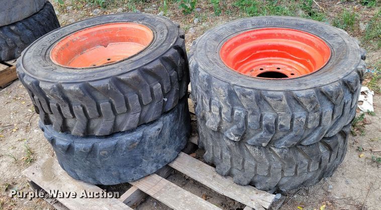 image for item KD9833 (4) 10-16.5 tires and wheels