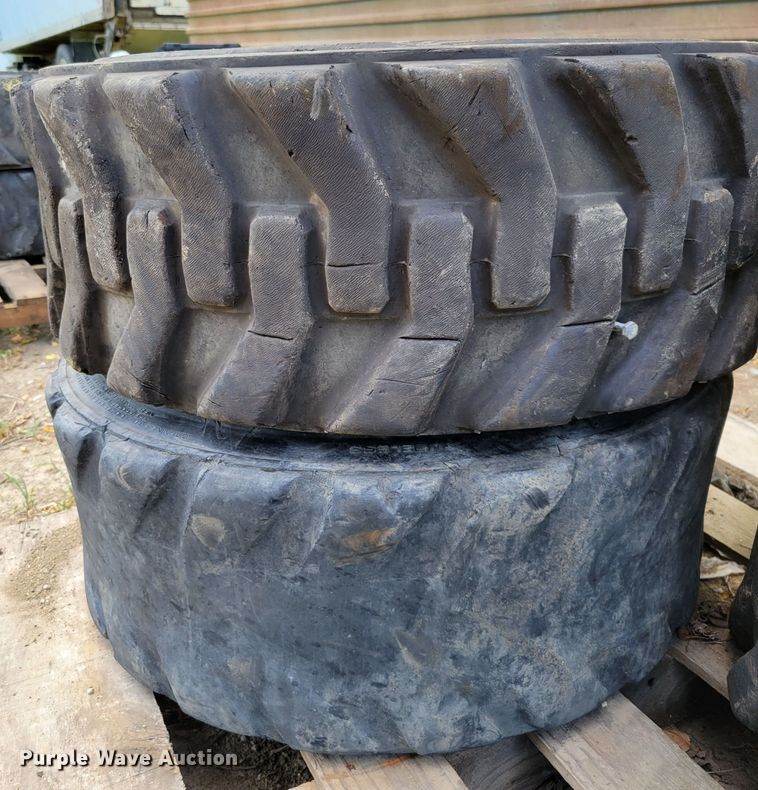 image for item KD9833 (4) 10-16.5 tires and wheels