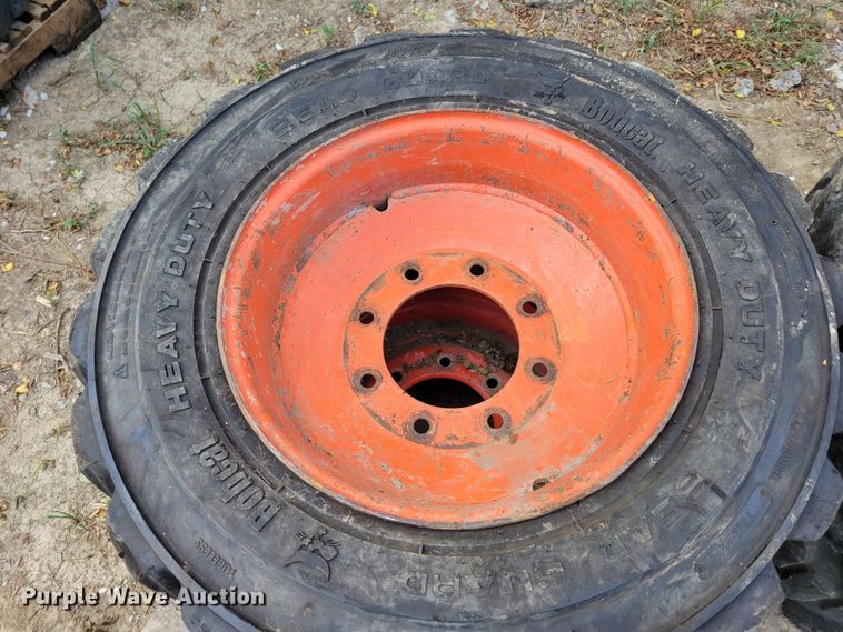 image for item KD9833 (4) 10-16.5 tires and wheels