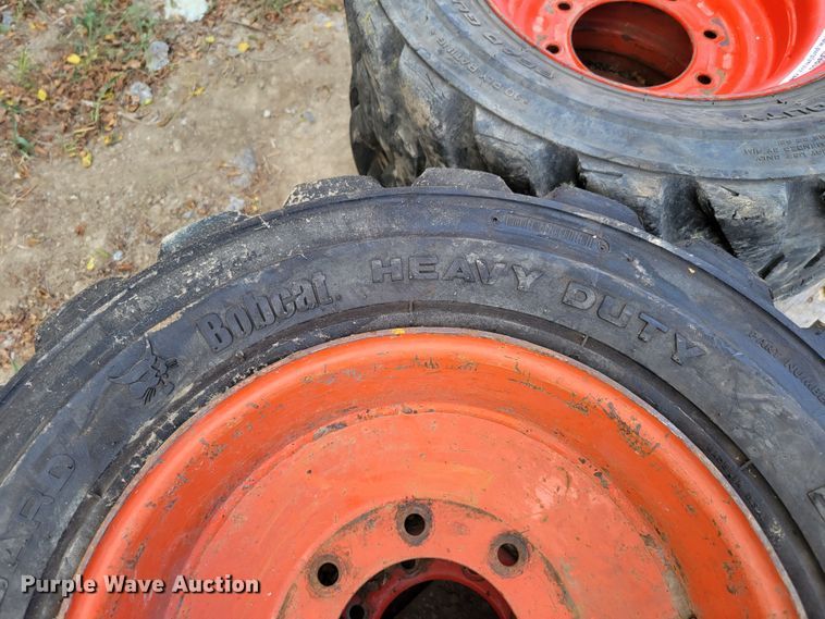 image for item KD9833 (4) 10-16.5 tires and wheels