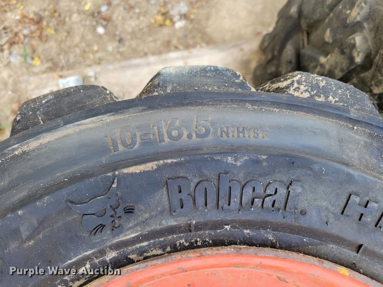 image for item KD9833 (4) 10-16.5 tires and wheels