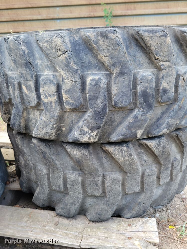 image for item KD9833 (4) 10-16.5 tires and wheels