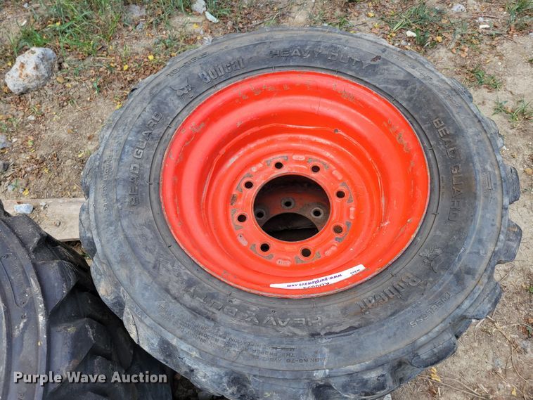 image for item KD9833 (4) 10-16.5 tires and wheels