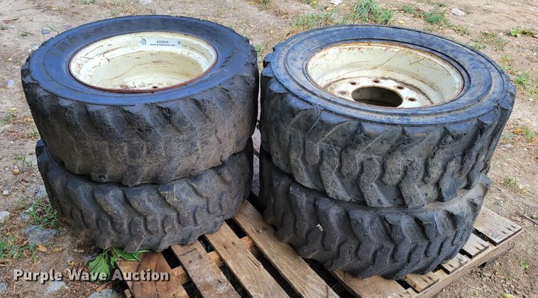 image for item KD9834 (4) 10-16.5 tires and wheels