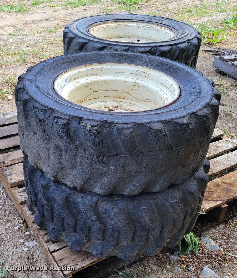 image for item KD9834 (4) 10-16.5 tires and wheels