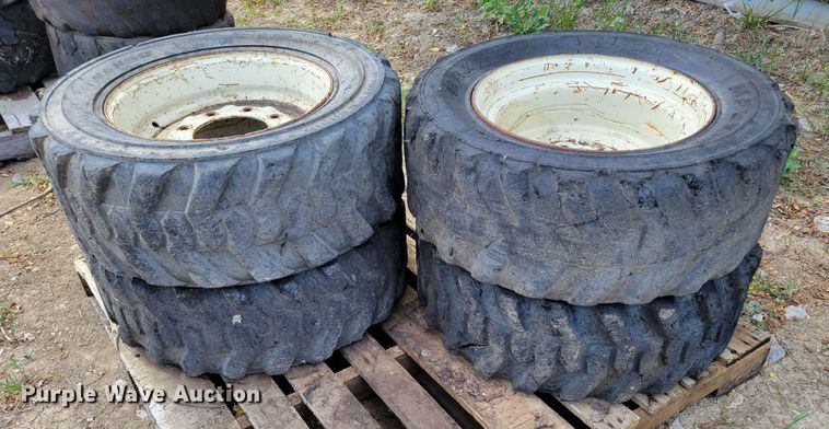 image for item KD9834 (4) 10-16.5 tires and wheels