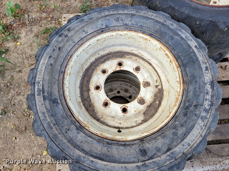 image for item KD9834 (4) 10-16.5 tires and wheels