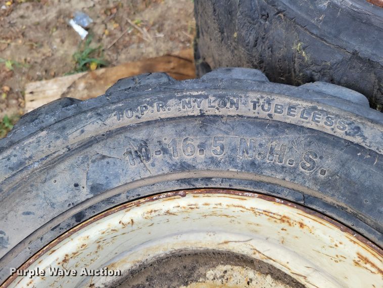 image for item KD9834 (4) 10-16.5 tires and wheels