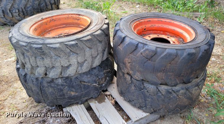 image for item KD9835 (4) 10-16.5 tires and wheels