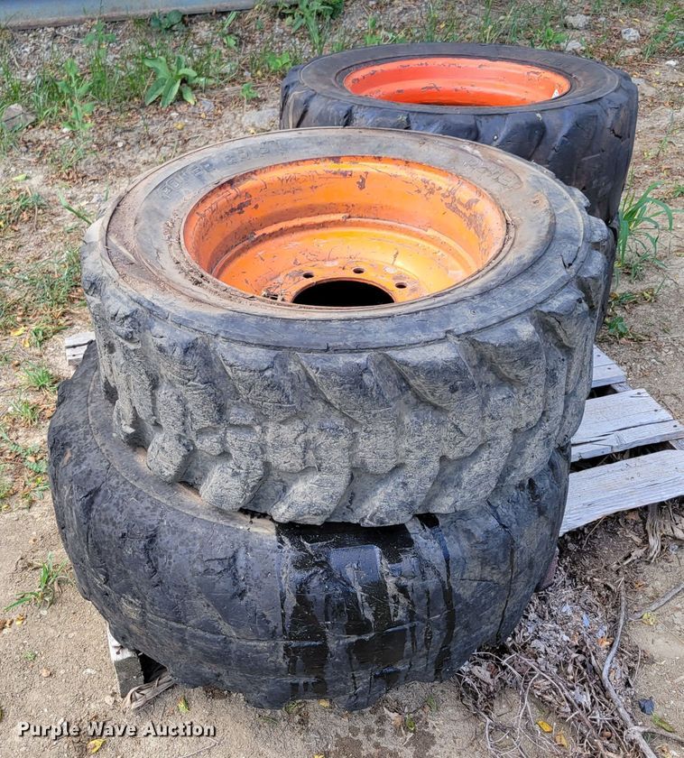 image for item KD9835 (4) 10-16.5 tires and wheels