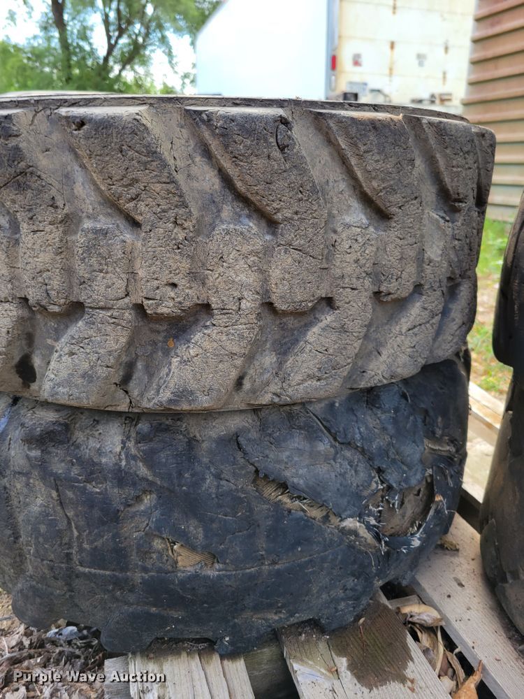 image for item KD9835 (4) 10-16.5 tires and wheels