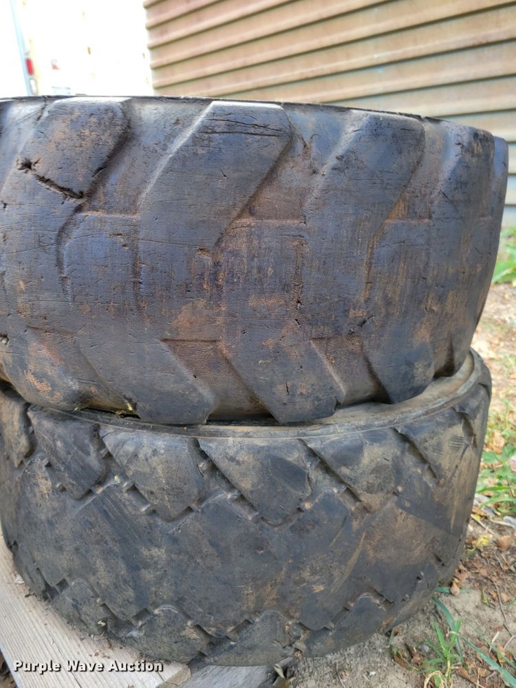 image for item KD9835 (4) 10-16.5 tires and wheels