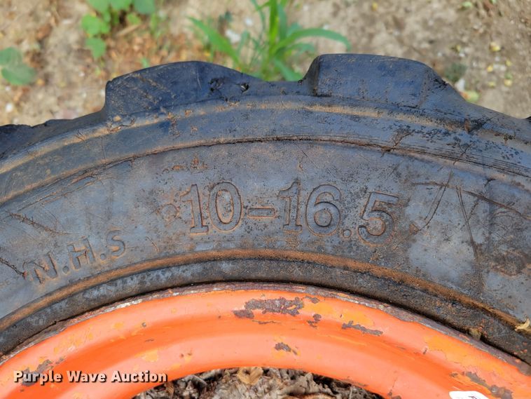 image for item KD9835 (4) 10-16.5 tires and wheels