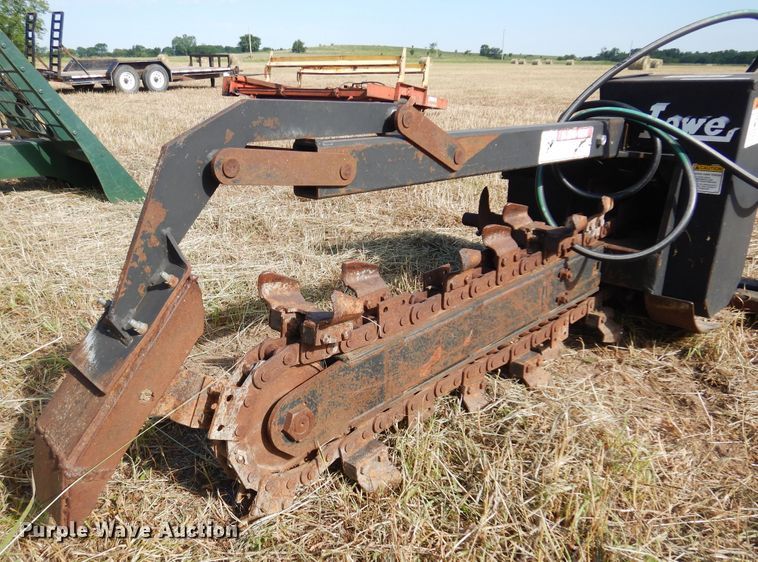 image for item KI9312 Lowe 14C  skid steer trencher