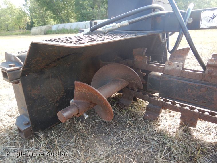 image for item KI9312 Lowe 14C  skid steer trencher