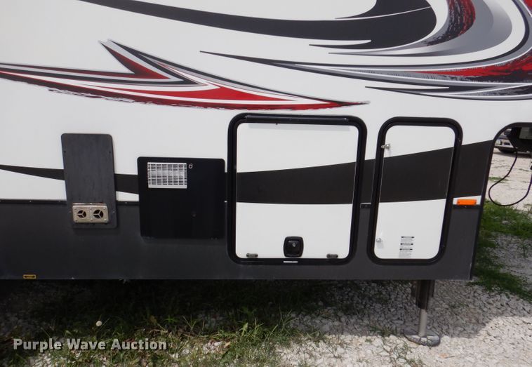 image for item KP9510 2013 Heartland Cyclone 3110  toy hauler camper