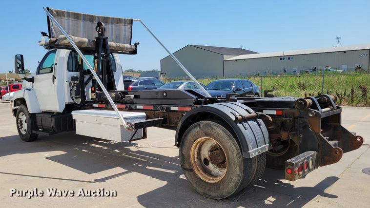 image for item DM2399 2005 GMC C6500  hook lift truck