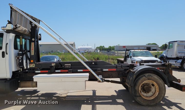 image for item DM2399 2005 GMC C6500  hook lift truck