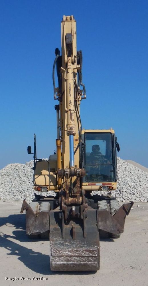 image for item DO1436 1999 Komatsu PW170ES-6K  wheeled excavator