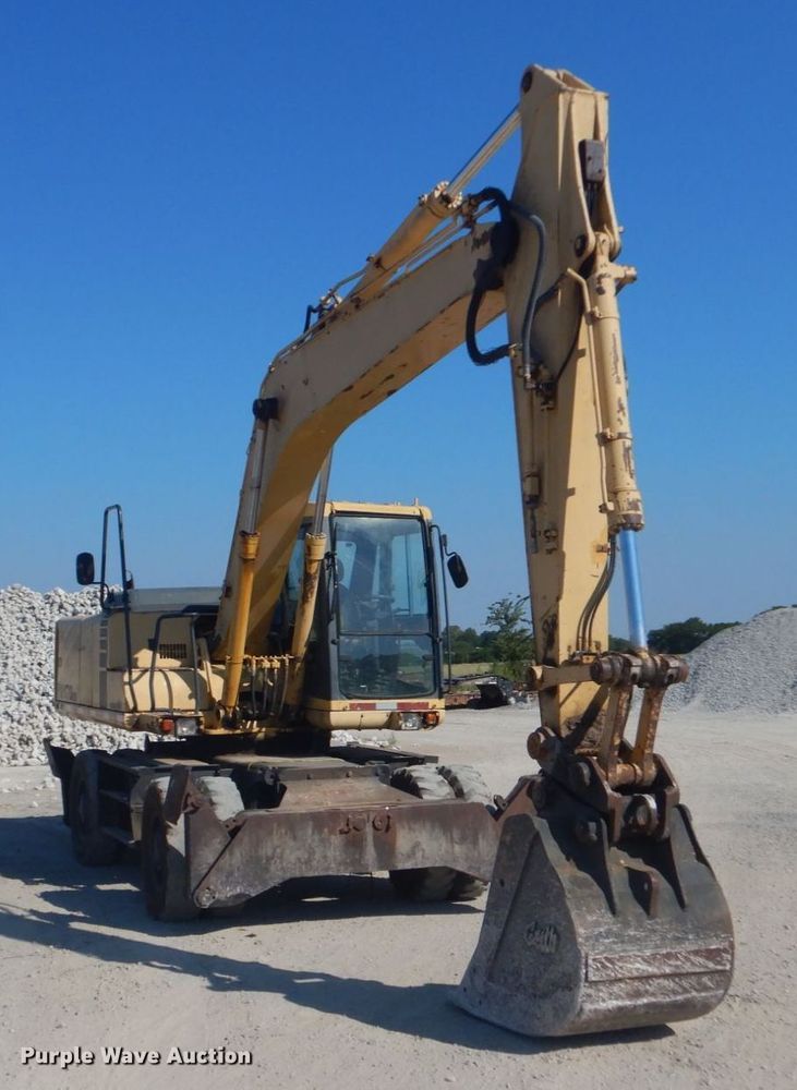 image for item DO1436 1999 Komatsu PW170ES-6K  wheeled excavator