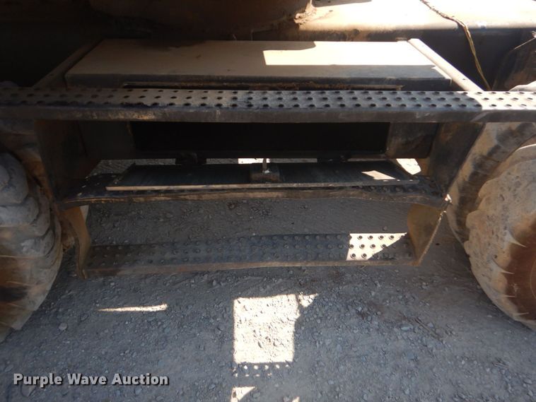 image for item DO1436 1999 Komatsu PW170ES-6K  wheeled excavator