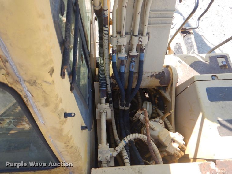 image for item DO1436 1999 Komatsu PW170ES-6K  wheeled excavator