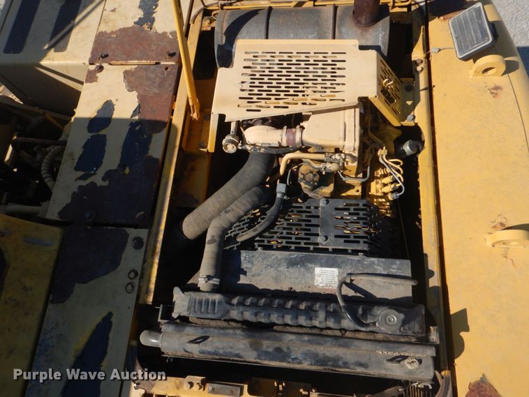 image for item DO1436 1999 Komatsu PW170ES-6K  wheeled excavator