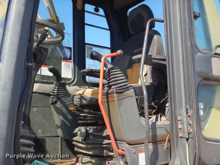 image for item DO1436 1999 Komatsu PW170ES-6K  wheeled excavator