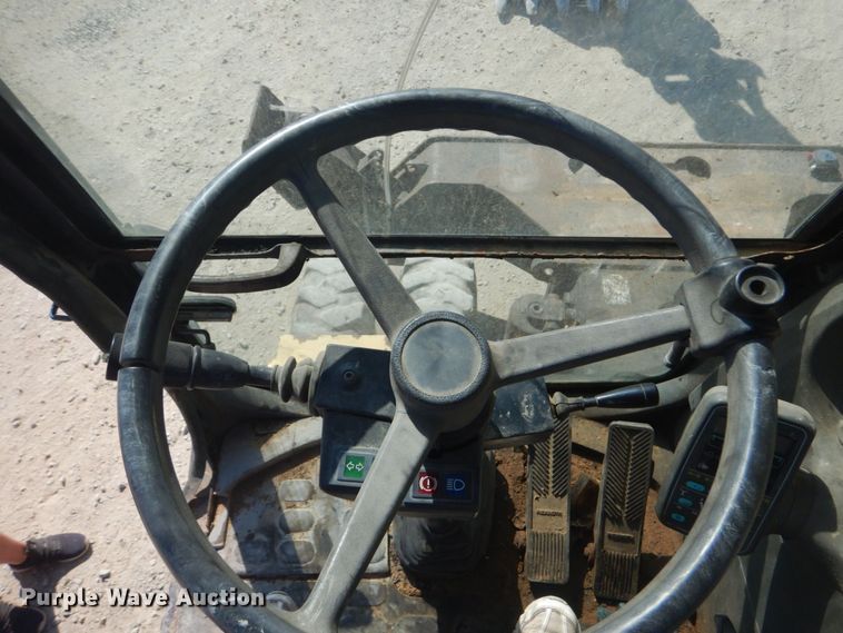 image for item DO1436 1999 Komatsu PW170ES-6K  wheeled excavator