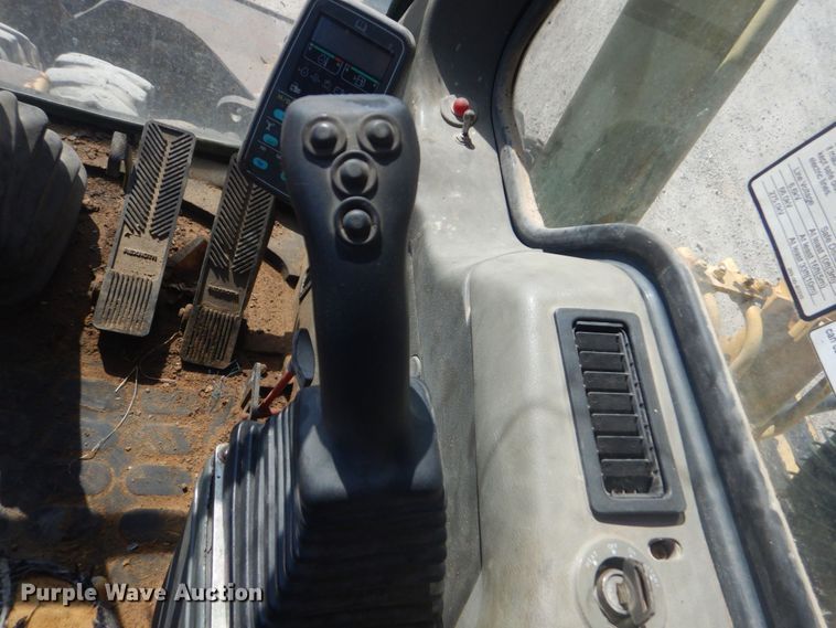 image for item DO1436 1999 Komatsu PW170ES-6K  wheeled excavator