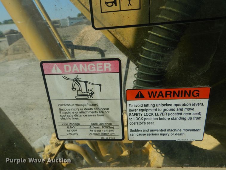 image for item DO1436 1999 Komatsu PW170ES-6K  wheeled excavator