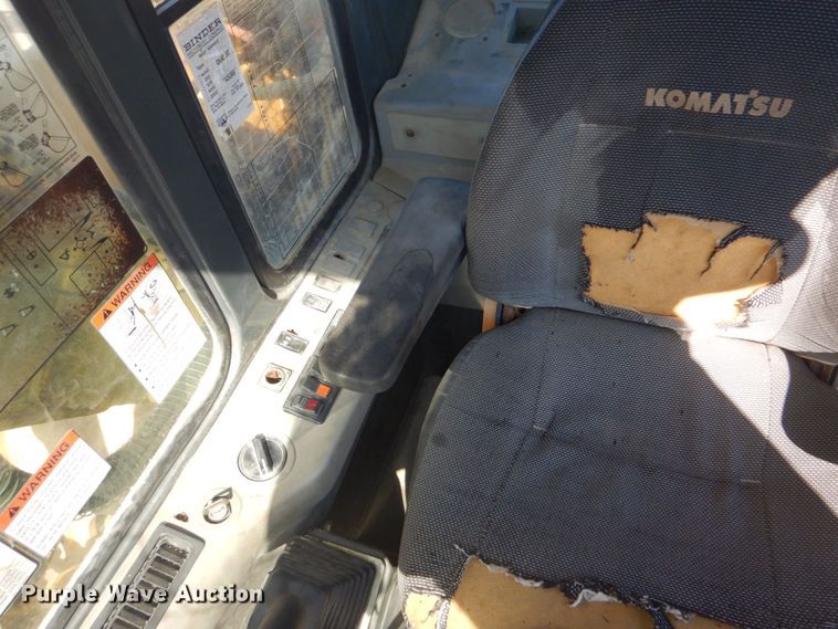 image for item DO1436 1999 Komatsu PW170ES-6K  wheeled excavator