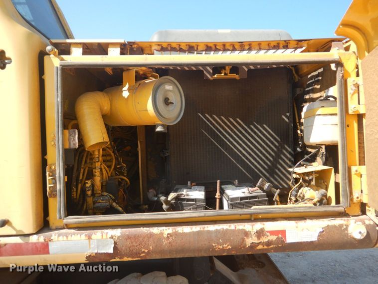 image for item DO1436 1999 Komatsu PW170ES-6K  wheeled excavator