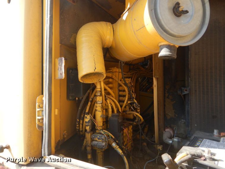 image for item DO1436 1999 Komatsu PW170ES-6K  wheeled excavator