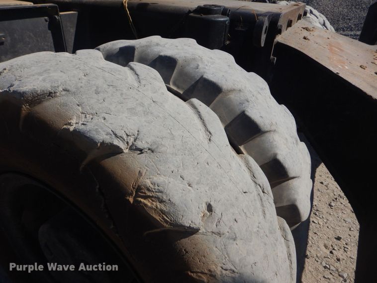 image for item DO1436 1999 Komatsu PW170ES-6K  wheeled excavator