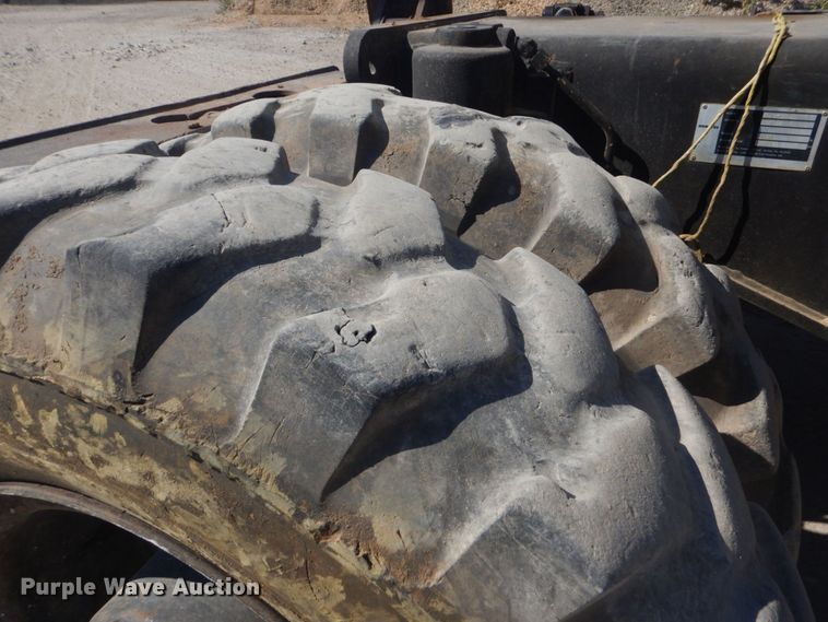 image for item DO1436 1999 Komatsu PW170ES-6K  wheeled excavator