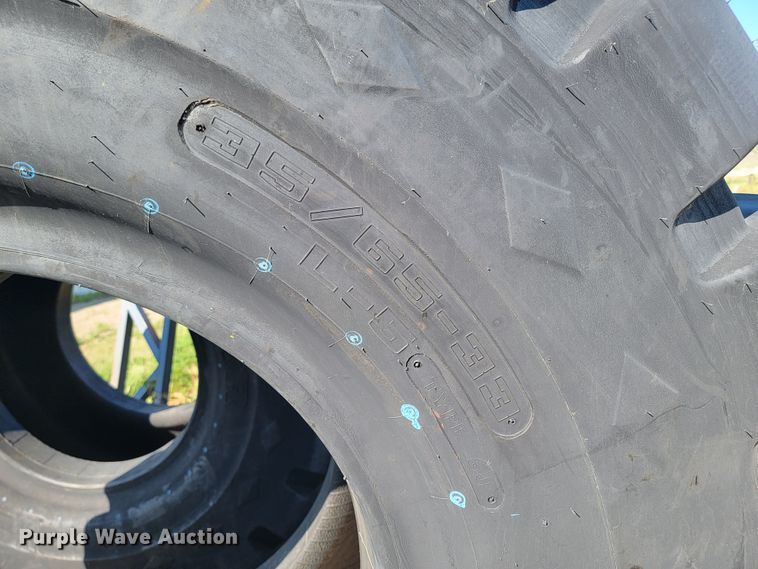 image for item JC9792 (2) Goodyear 35/65-33 tires