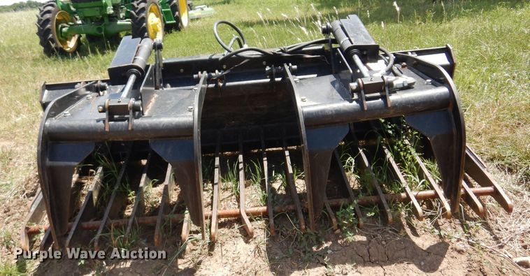 image for item KI9275 John Deere GT80  skid steer rock grapple bucket