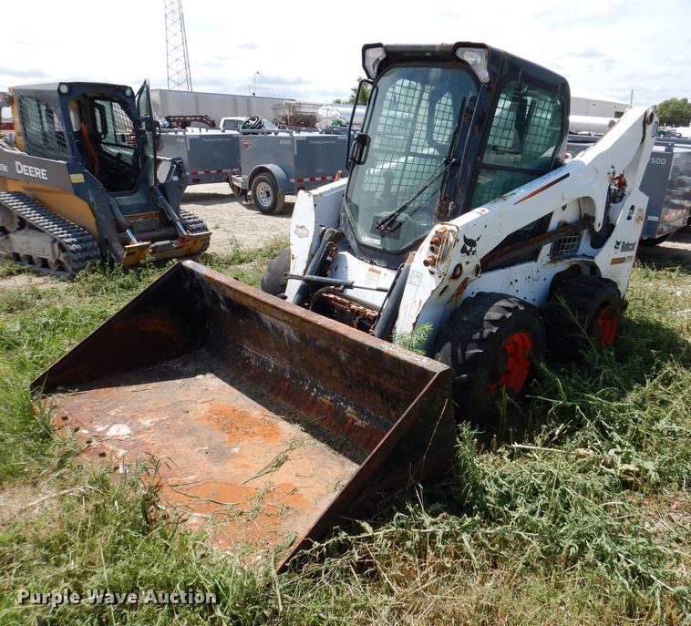 image for item KP9503 2015 Bobcat S750  skid steer loader