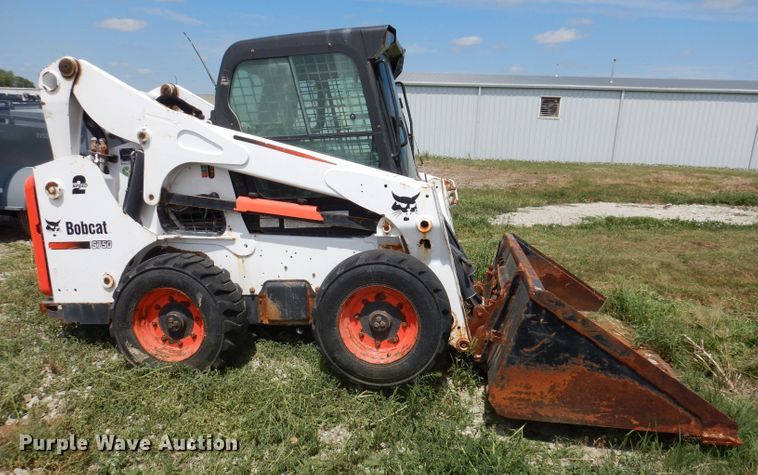 image for item KP9503 2015 Bobcat S750  skid steer loader